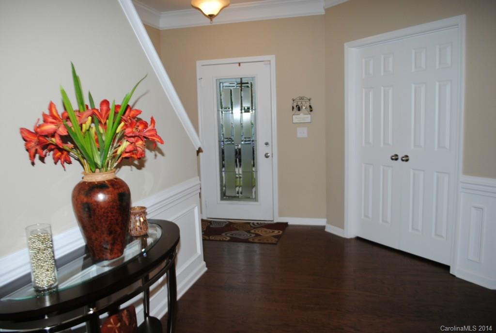 2604 Aldergrove Road Matthews, NC 28105 - Photo 2 of 16 a living room with furniture and a potted plant