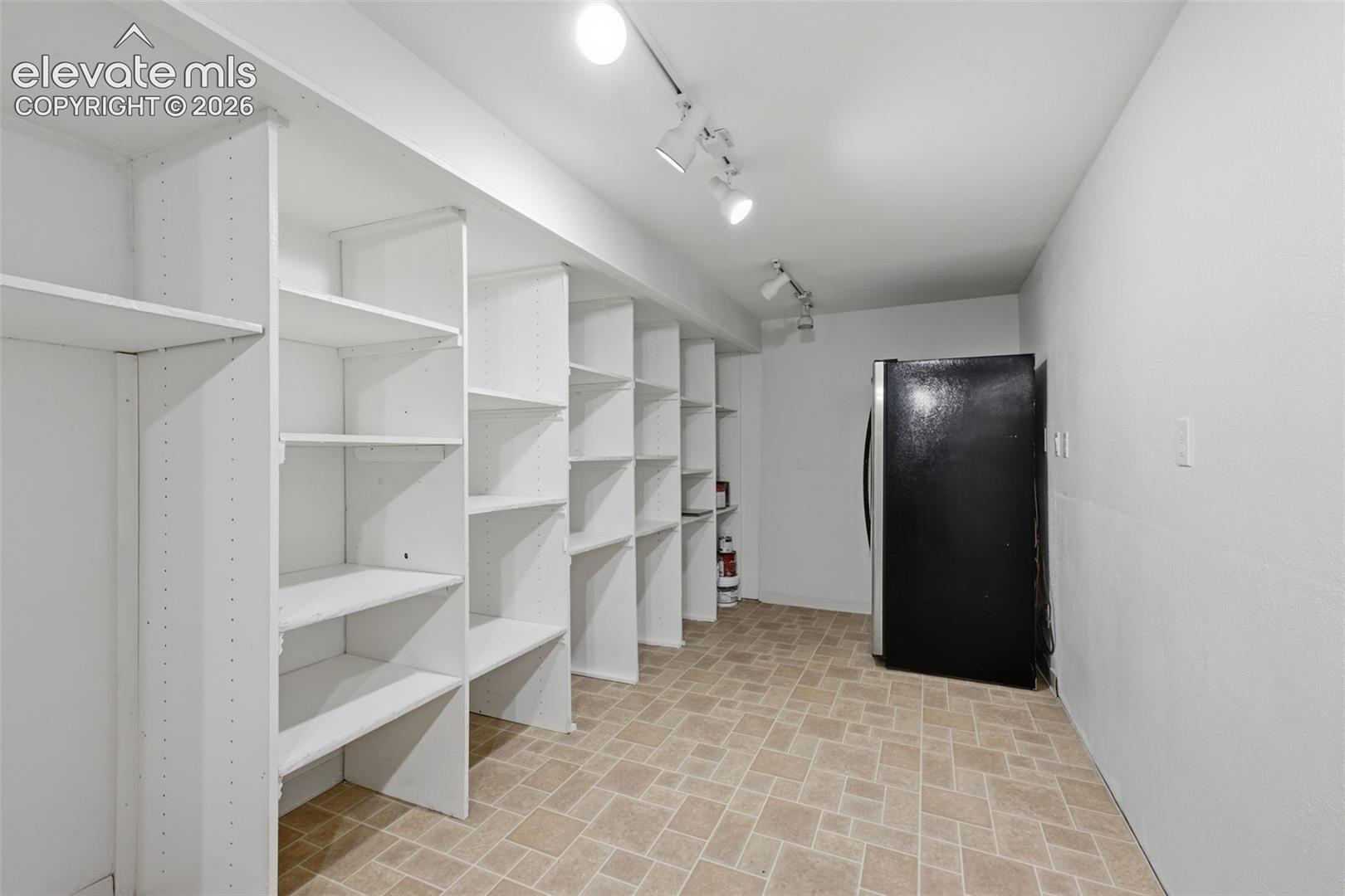 1316 Prairie Road Colorado Springs, CO 80909 - Photo 43 of 50 Storage Room & Laundry Area