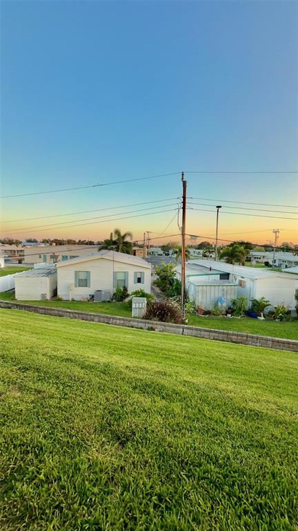 4207 13th Street East Ellenton, FL 34222 - Photo 14 of 15 a view of a green field with an ocean view