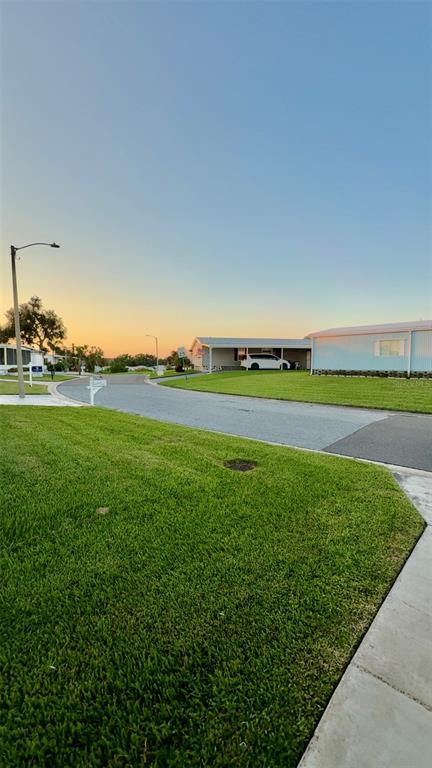 4207 13th Street East Ellenton, FL 34222 - Photo 10 of 15 a view of a big yard next to a yard