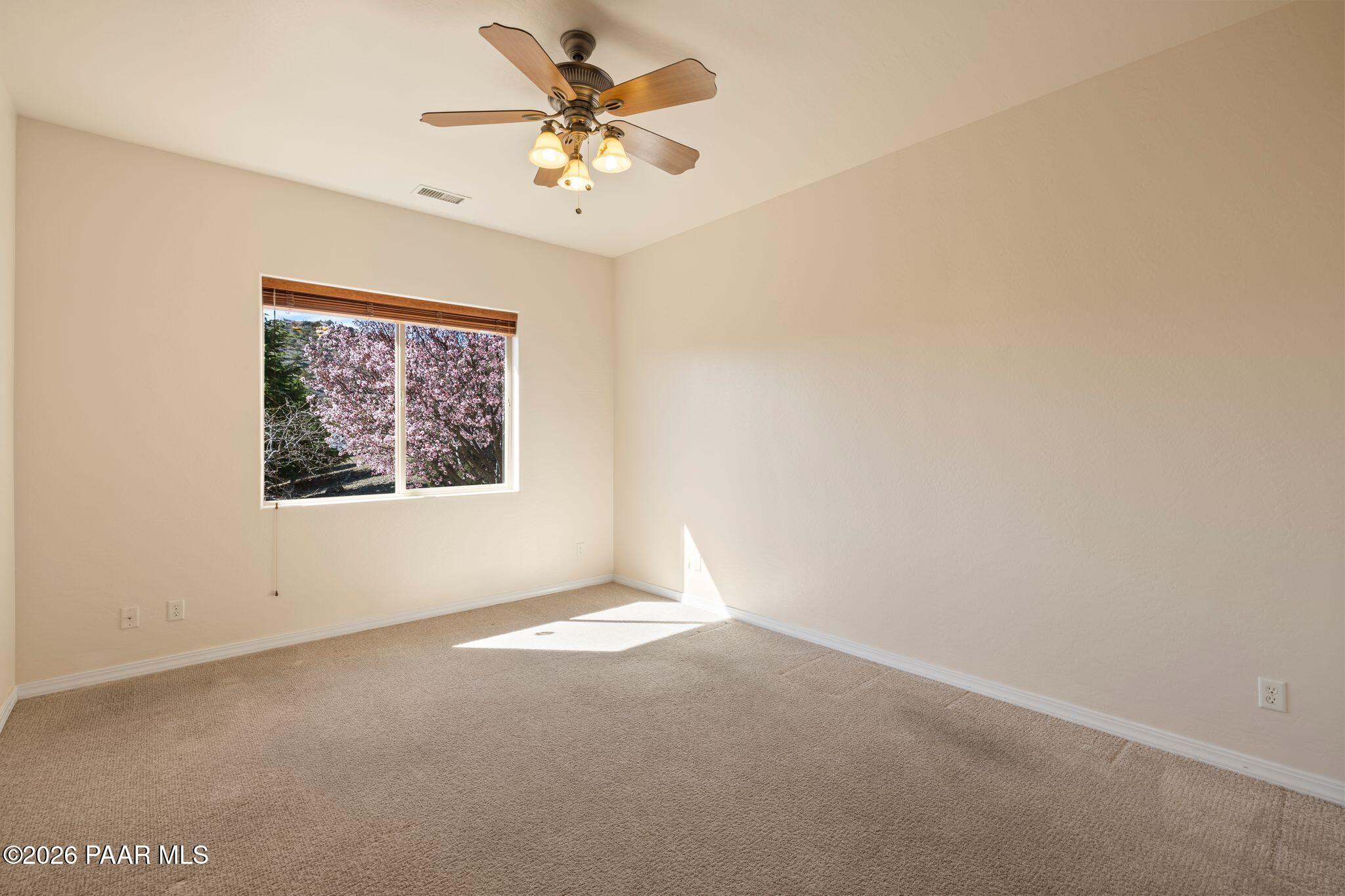 4677 Sharp Shooter Way Prescott, AZ 86301 - Photo 23 of 64 an empty room with a window