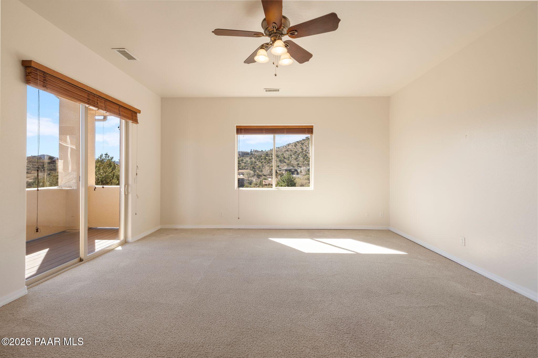 4677 Sharp Shooter Way Prescott, AZ 86301 - Photo 33 of 64 a view of an empty room with a window