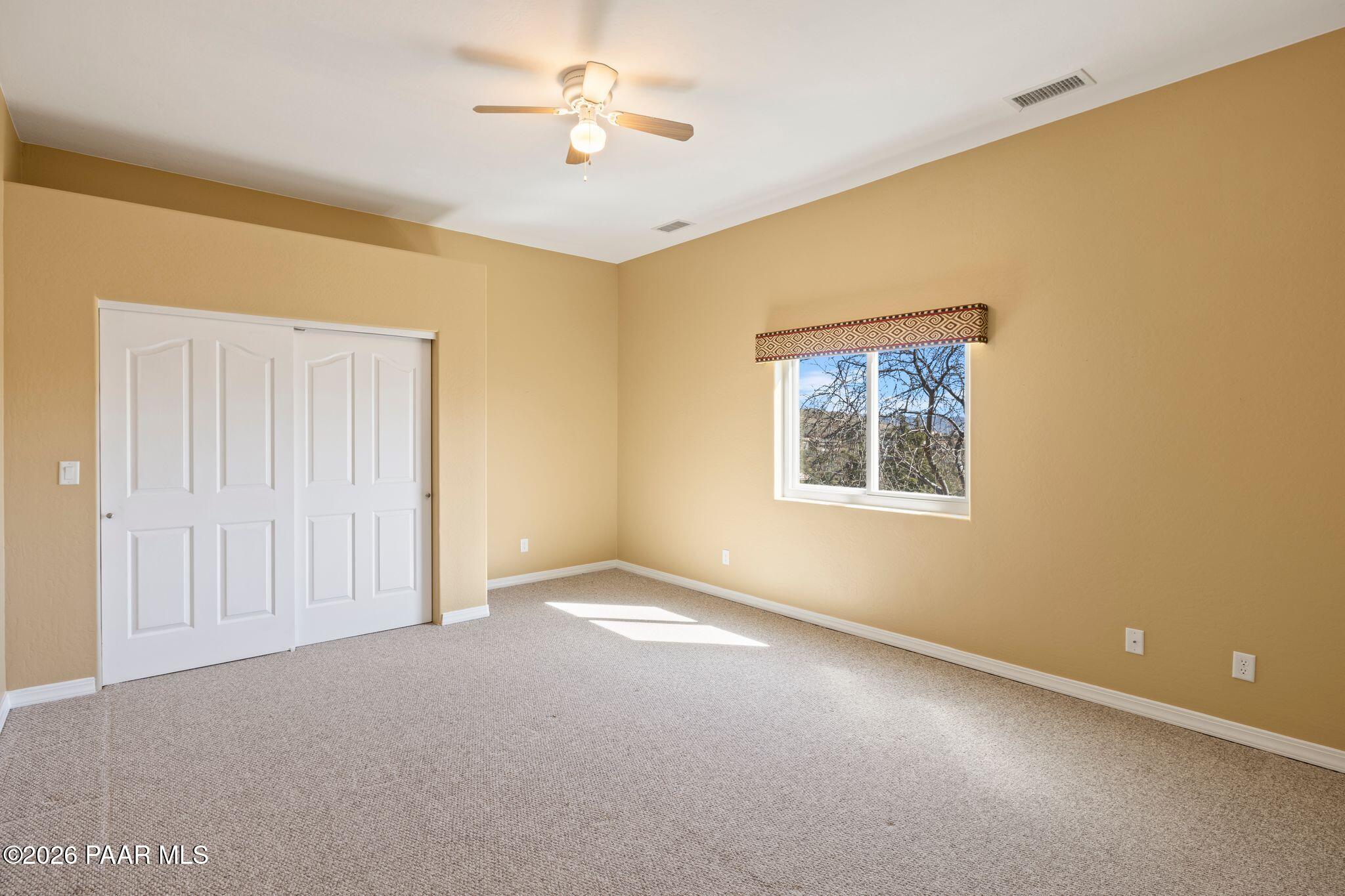 4677 Sharp Shooter Way Prescott, AZ 86301 - Photo 46 of 64 a view of an empty room with a window