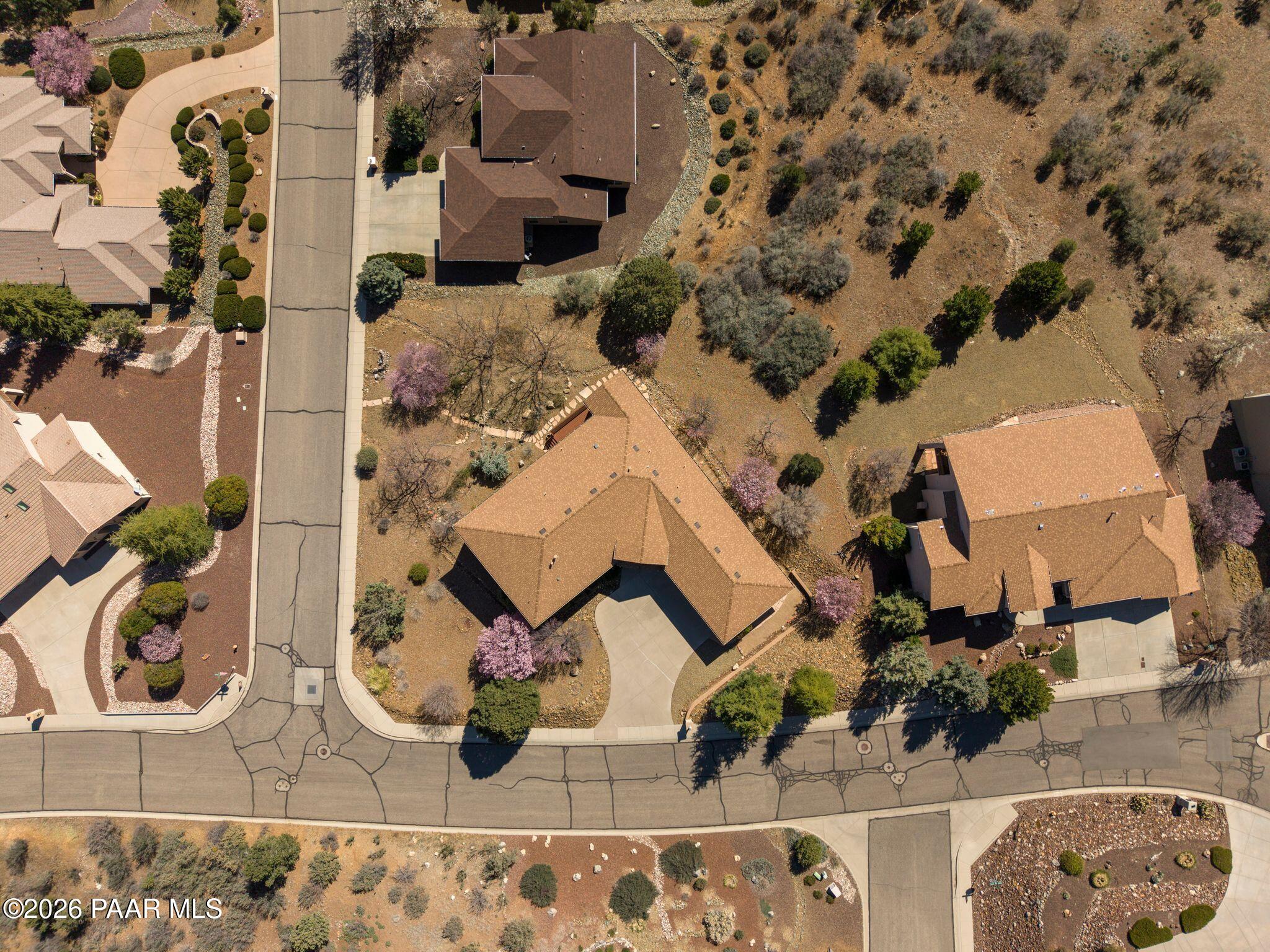 4677 Sharp Shooter Way Prescott, AZ 86301 - Photo 62 of 64 an aerial view of a house with a yard