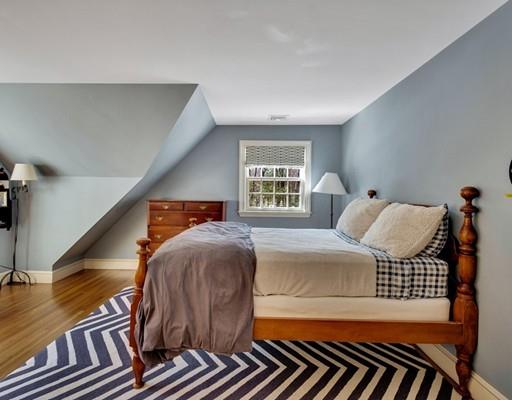 26 Old Farm Road Lincoln, MA 01773 - Photo 18 of 30 a bedroom with a bed and wooden floor