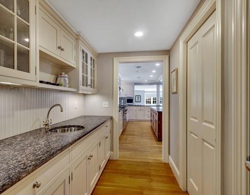 26 Old Farm Road Lincoln, MA 01773 - Photo 8 of 30 a kitchen with stainless steel appliances granite countertop a sink and cabinets