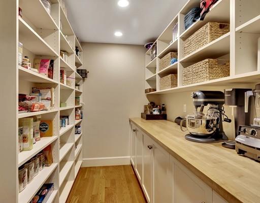 26 Old Farm Road Lincoln, MA 01773 - Photo 9 of 30 a view of walk in closet with clothes and shoes