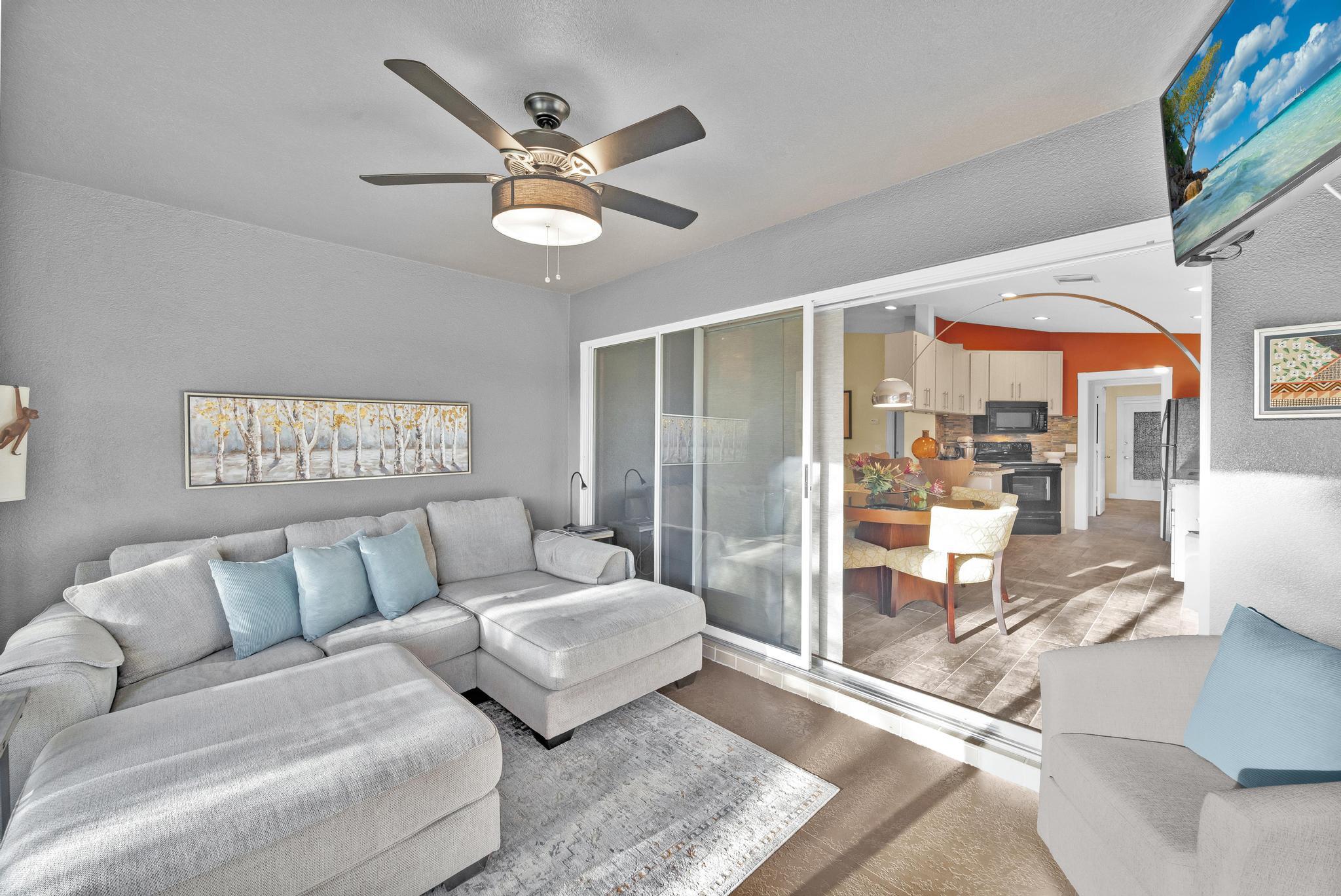 1568 Southwest Springfield Court Palm City, FL 34990 - Photo 14 of 31 a living room with furniture and a large window