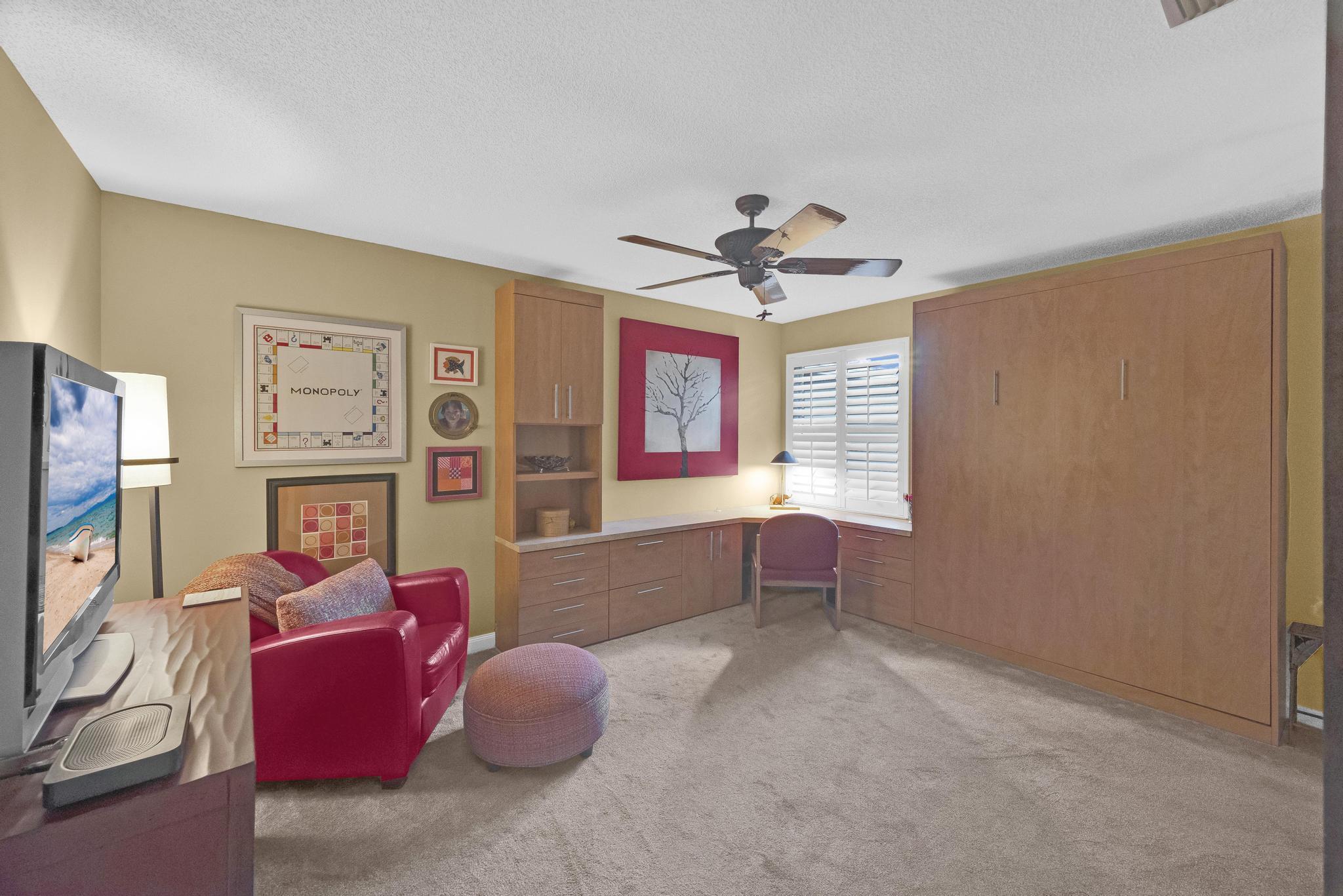 1568 Southwest Springfield Court Palm City, FL 34990 - Photo 17 of 31 a living room with furniture and a window