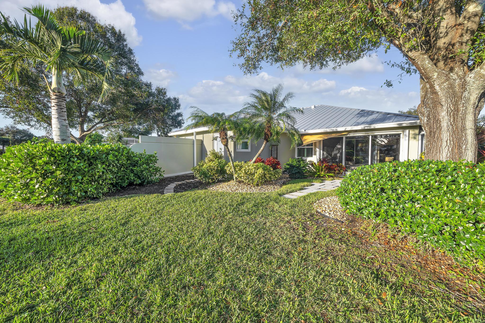 1568 Southwest Springfield Court Palm City, FL 34990 - Photo 27 of 31 a view of a yard in front of house