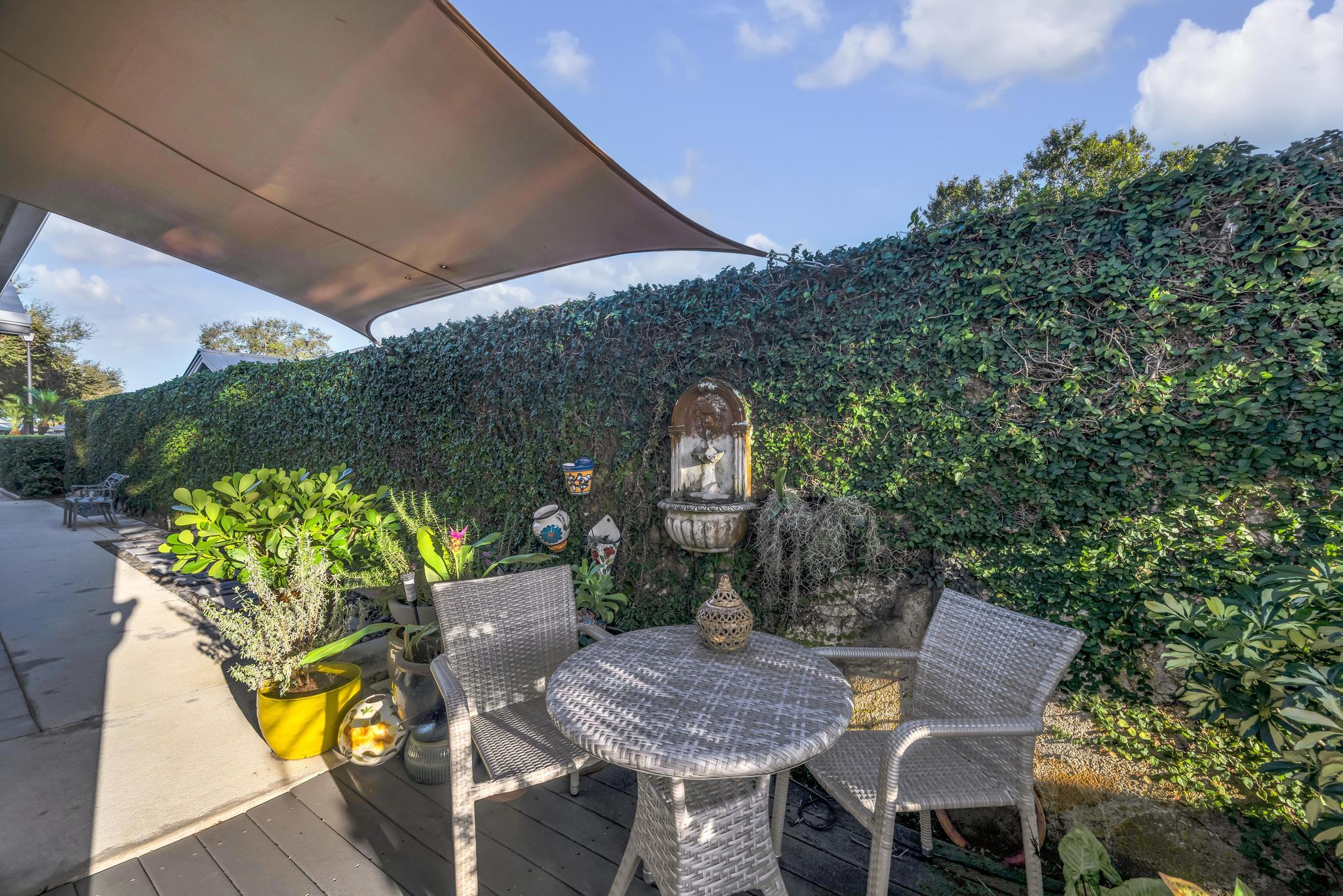 1568 Southwest Springfield Court Palm City, FL 34990 - Photo 30 of 31 a view of a chairs and table in the patio