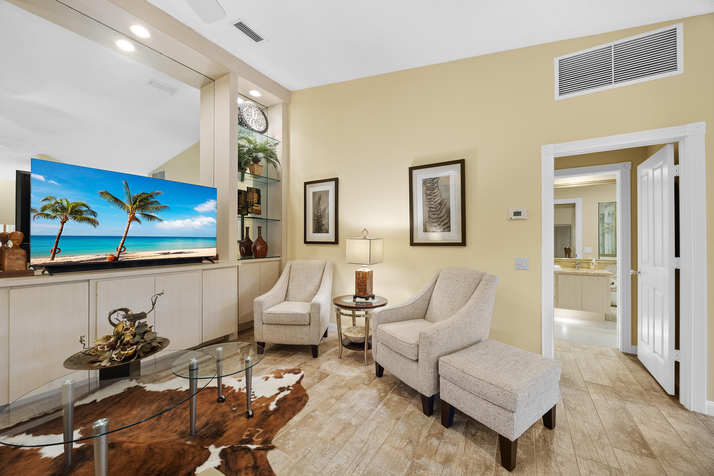 1568 Southwest Springfield Court Palm City, FL 34990 - Photo 5 of 31 a living room with furniture and painting on the wall