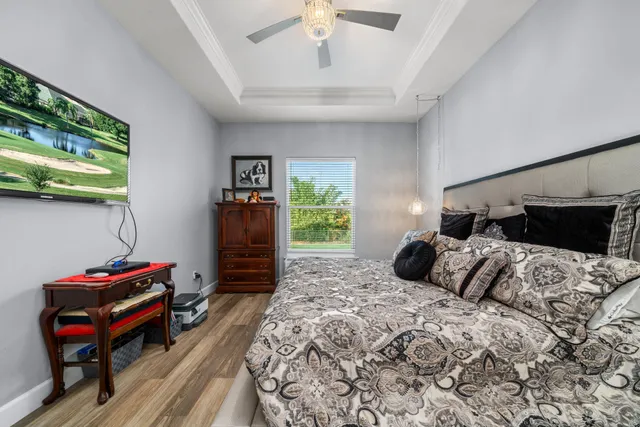 a view of a backyard with swimming pool