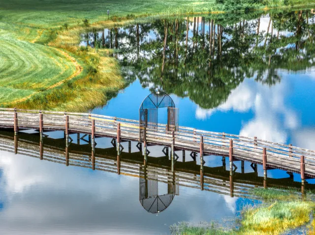 a view of a backyard with sitting area