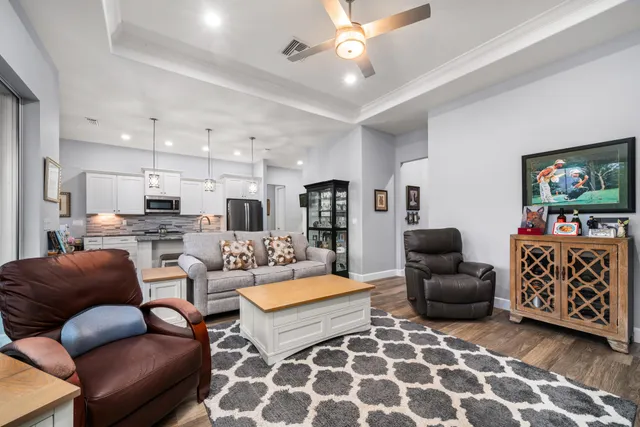 a balcony with furniture and a garden