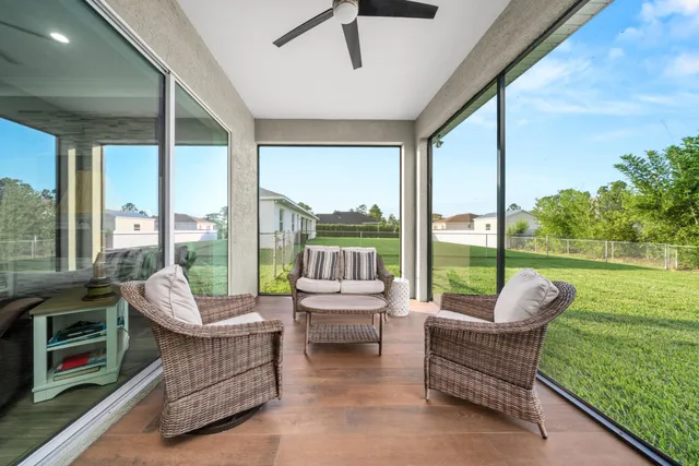 a view of room with window and wooden floor