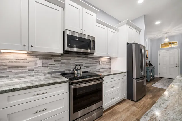 an aerial view of a house having yard