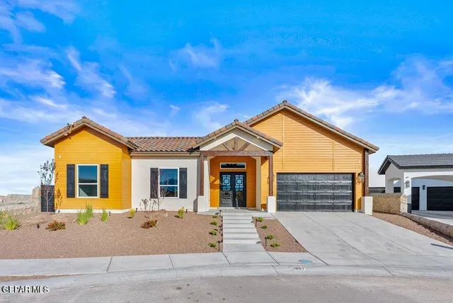 a view of outdoor space yard and front view of a house