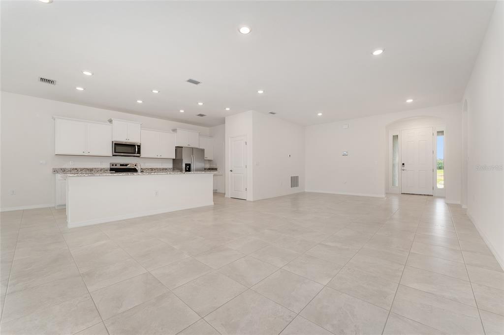 4062 Northwest 48th Terrace Ocala, FL 34482 - Photo 21 of 81 a view of kitchen with kitchen island stainless steel appliances cabinets a sink and a counter top