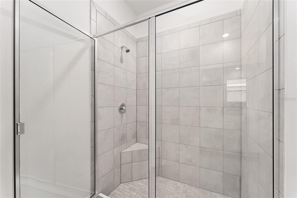 4062 Northwest 48th Terrace Ocala, FL 34482 - Photo 39 of 81 a bathroom with a glass shower door