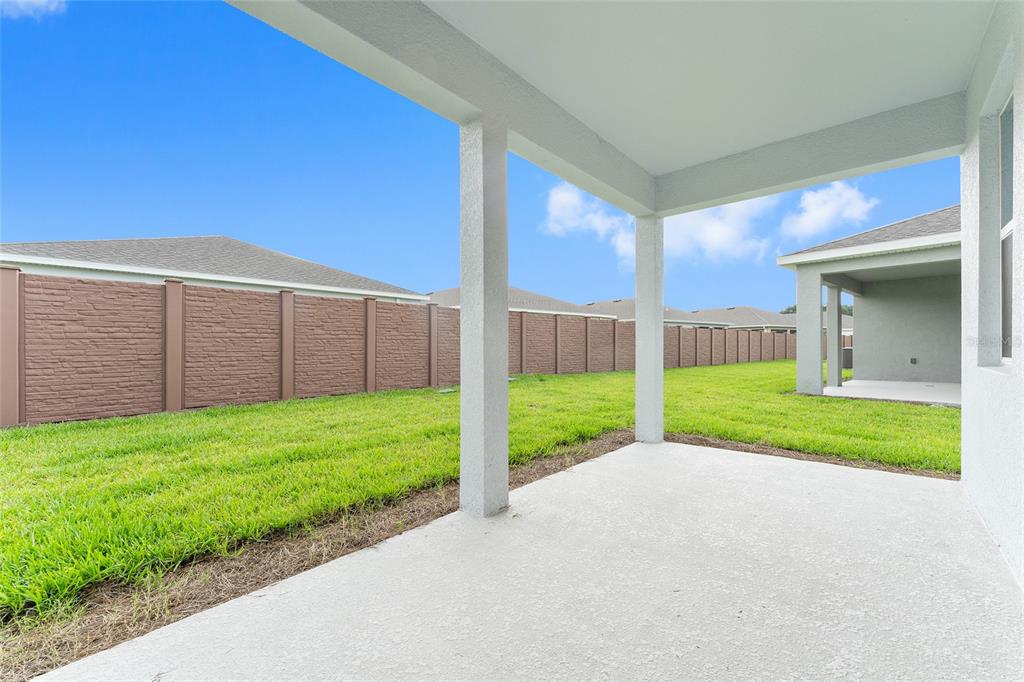4062 Northwest 48th Terrace Ocala, FL 34482 - Photo 52 of 81 a view of a house with a yard and a road