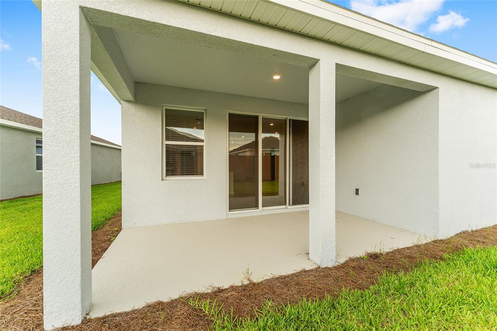 4062 Northwest 48th Terrace Ocala, FL 34482 - Photo 53 of 81 a front view of a house with a yard