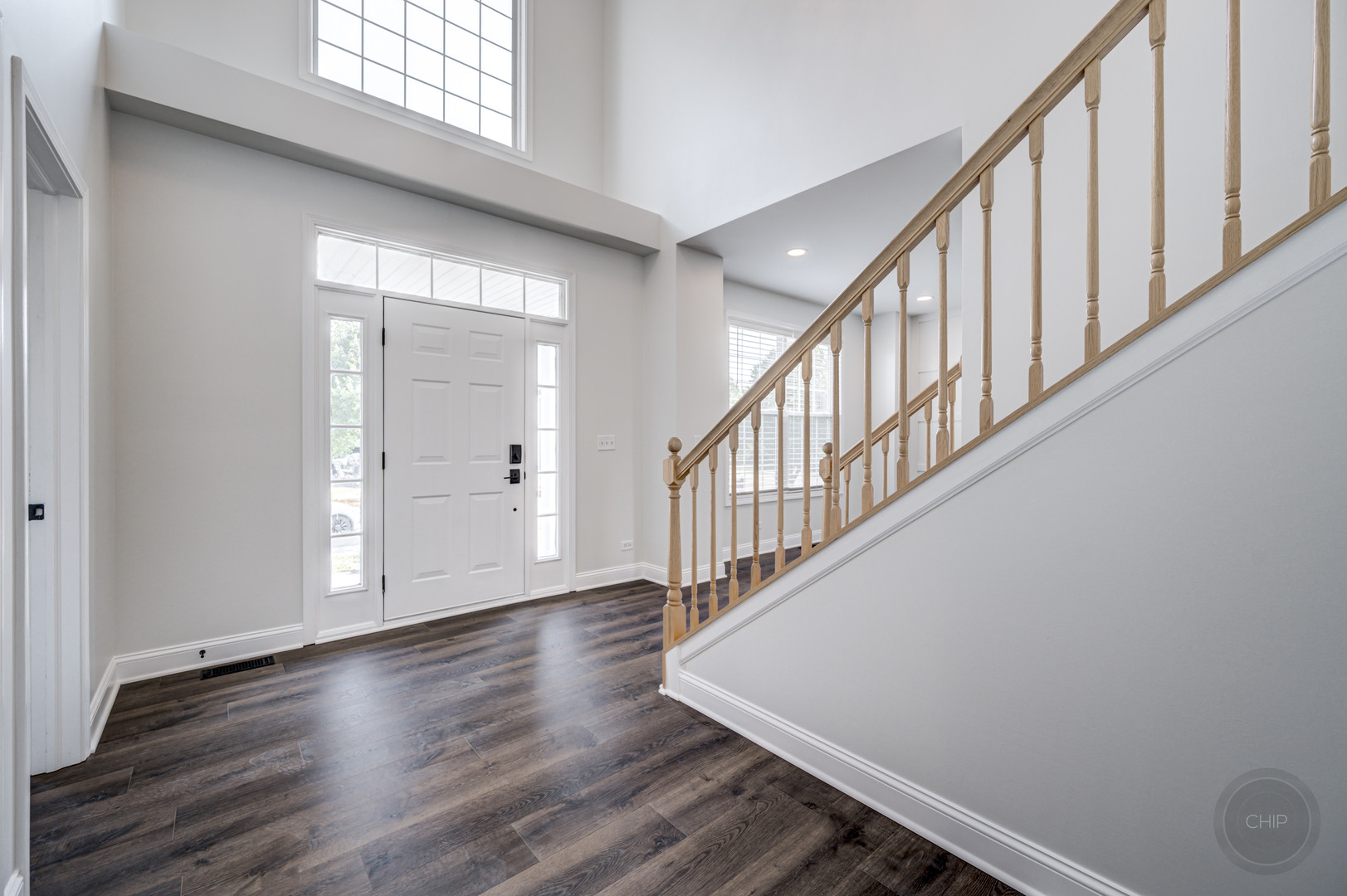 12948 Parterre Place Plainfield, IL 60585 - Photo 3 of 35 a view of an entryway with wooden floor