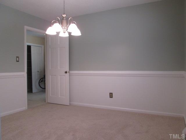 7205 St Ledger Drive Raleigh, NC 27613 - Photo 9 of 25 Formal dining room! One of the many great things about this home is it has three rooms down stairs such as a living dining and family where many only have a living and dining! Plenty of room and the family room is on the back for privacy!