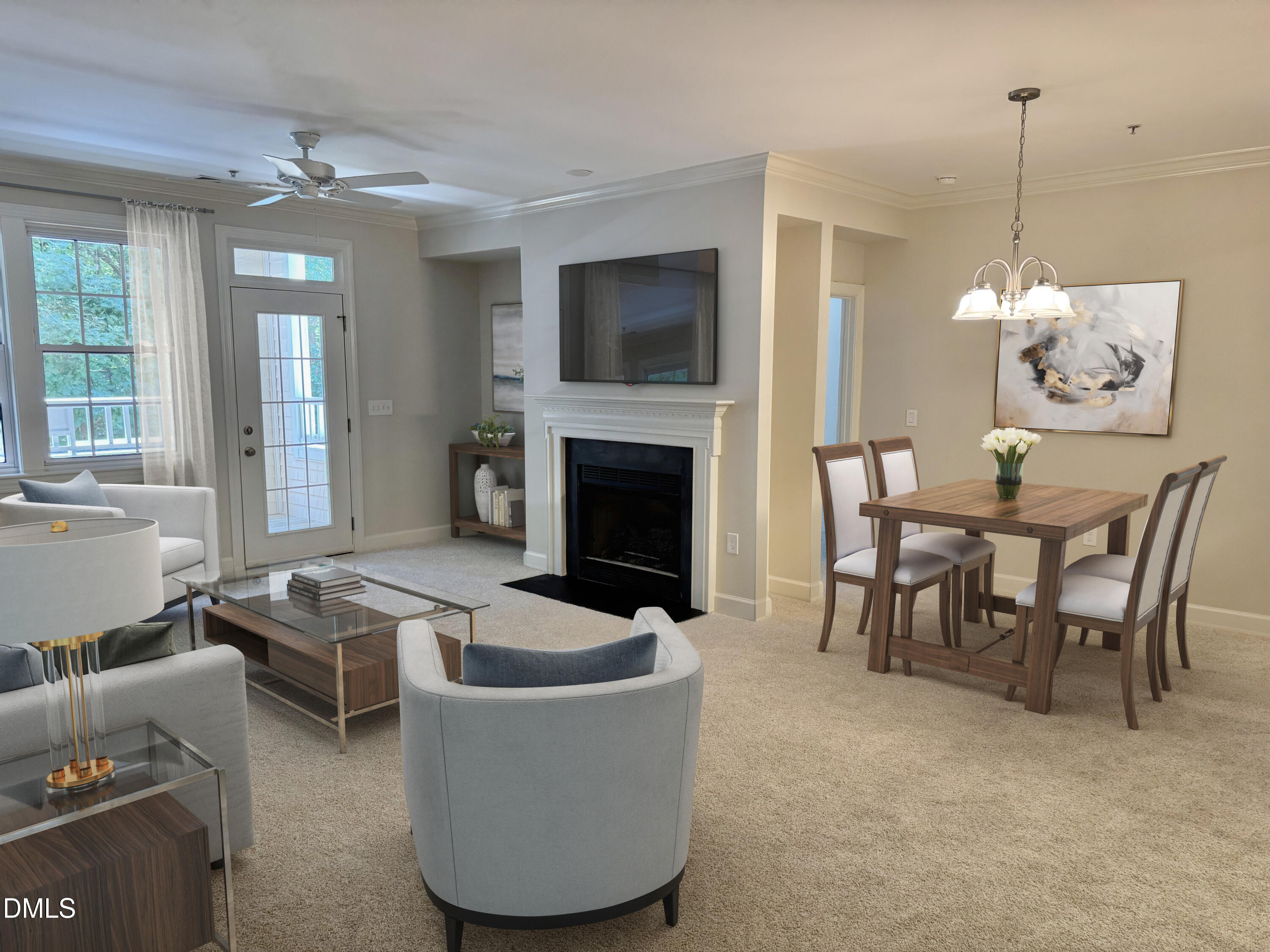 a living room with furniture a flat screen tv and a fireplace