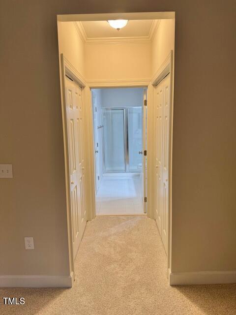 100 Northbrook Drive, Unit 205 Raleigh, NC 27609 - Photo 20 of 34 a view of a hallway with wooden shelves