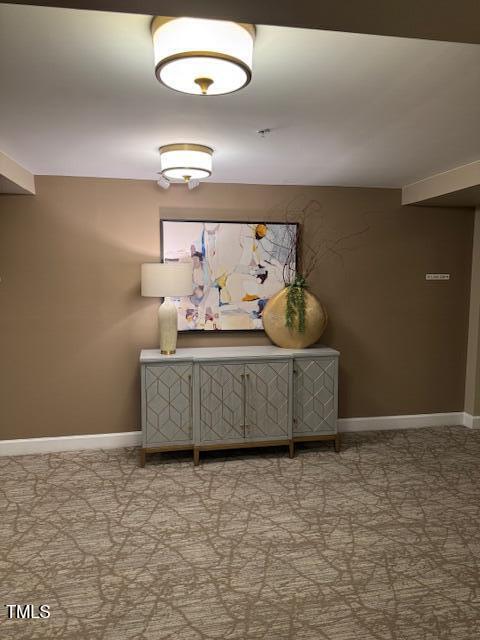 100 Northbrook Drive, Unit 205 Raleigh, NC 27609 - Photo 26 of 34 a living room with a couch