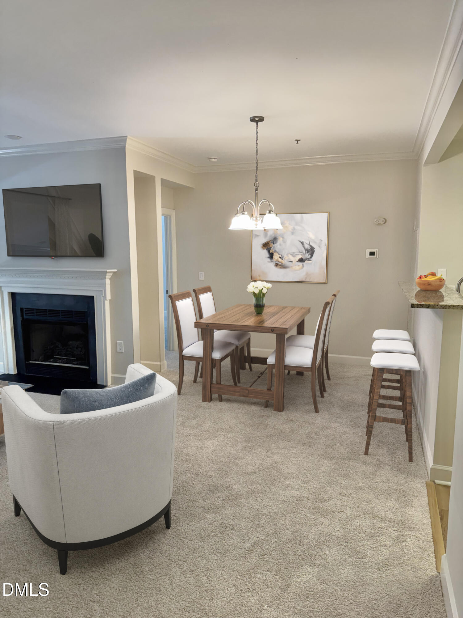 100 Northbrook Drive, Unit 205 Raleigh, NC 27609 - Photo 5 of 34 a view of a dining room with furniture and chandelier