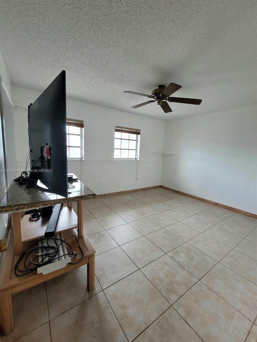 11 Olive Drive, Unit J Hialeah, FL 33010 - Photo 12 of 20 a view of livingroom with furniture