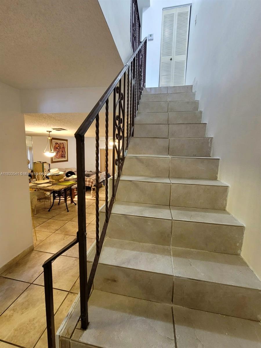 11 Olive Drive, Unit J Hialeah, FL 33010 - Photo 14 of 20 a view of entryway and hall