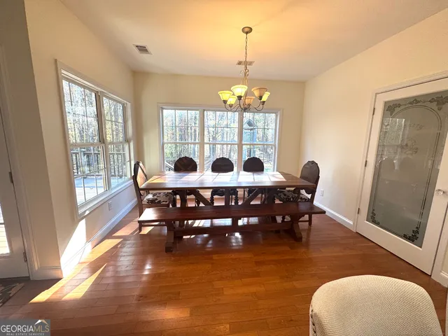 a close view of a utility room with a view of kitchen