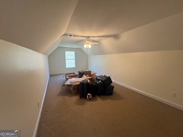 a view of balcony with wooden floor