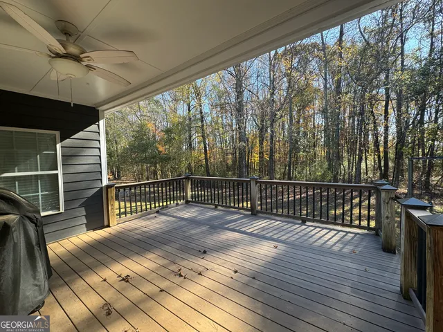 a view of a yard with a large trees