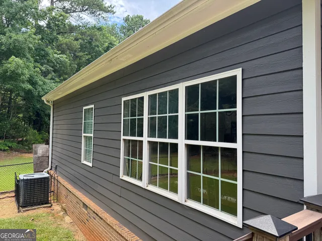 a view of a golf course with a lake