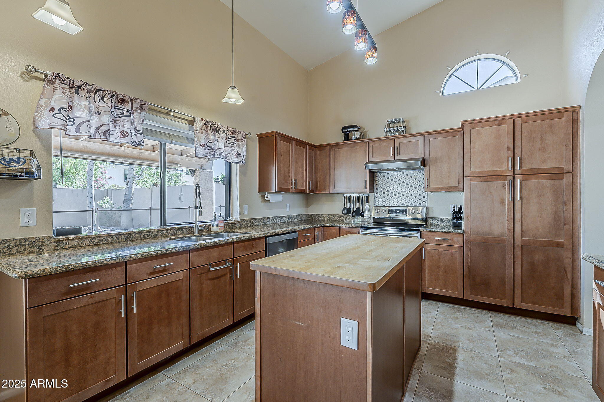 1927 East Ranch Road Tempe, AZ 85284 - Photo 11 of 64 a kitchen with a sink stove and refrigerator