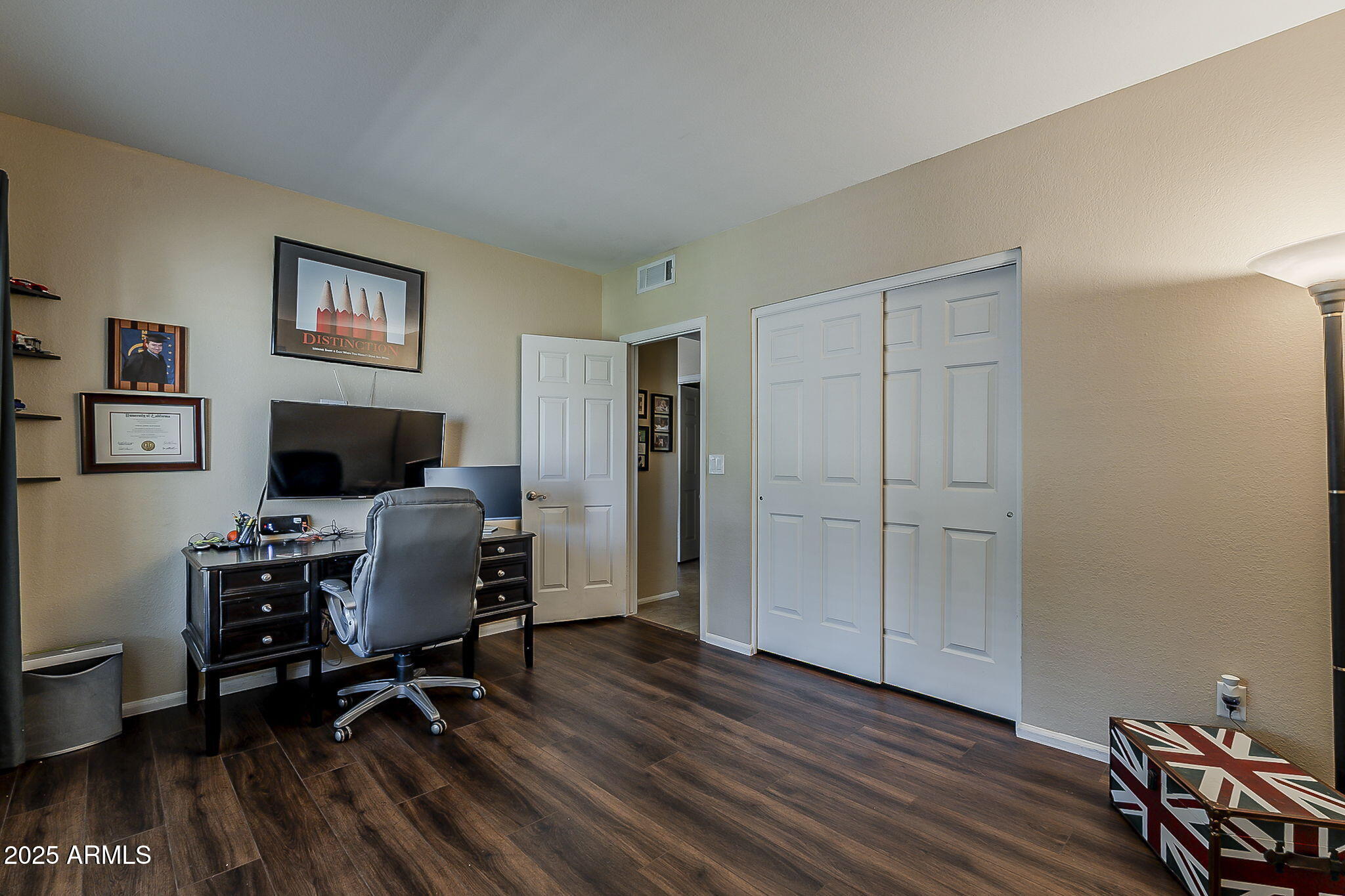 1927 East Ranch Road Tempe, AZ 85284 - Photo 21 of 64 a view of a workspace with furniture and wooden floor