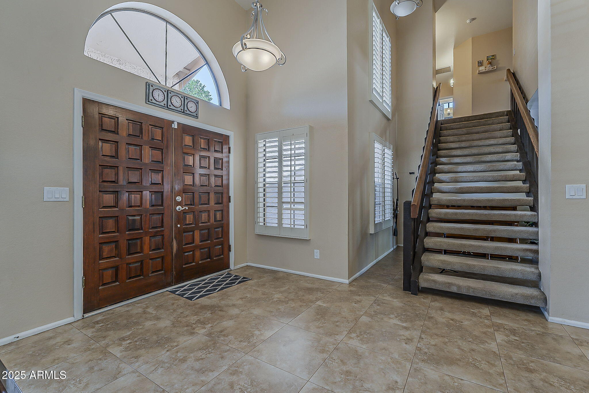 1927 East Ranch Road Tempe, AZ 85284 - Photo 28 of 64 wooden floor in an empty room with a staircase