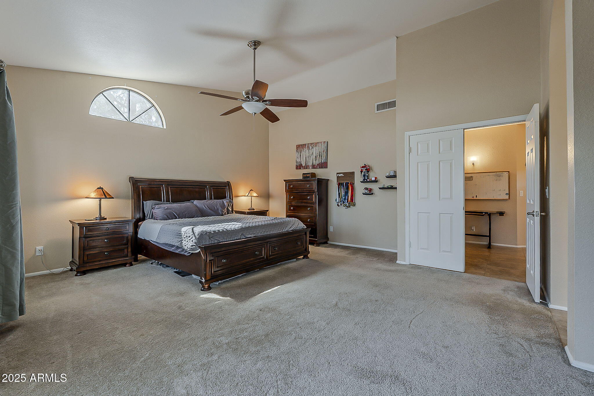 1927 East Ranch Road Tempe, AZ 85284 - Photo 31 of 64 a bedroom with a bed and ceiling fan