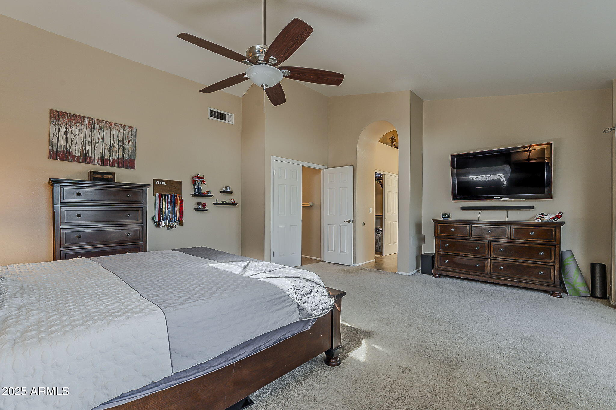 1927 East Ranch Road Tempe, AZ 85284 - Photo 32 of 64 a bedroom with a bed and a flat screen tv