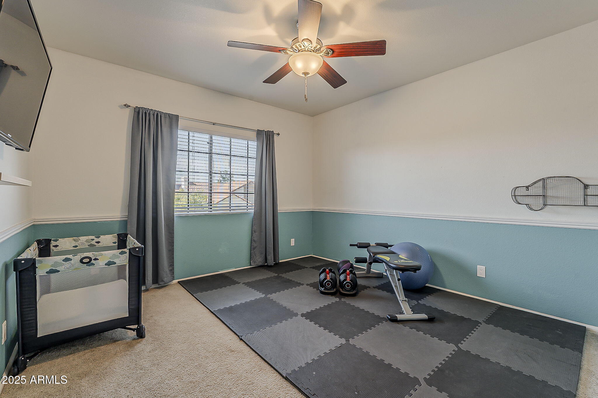 1927 East Ranch Road Tempe, AZ 85284 - Photo 35 of 64 a room with chandelier fan and windows