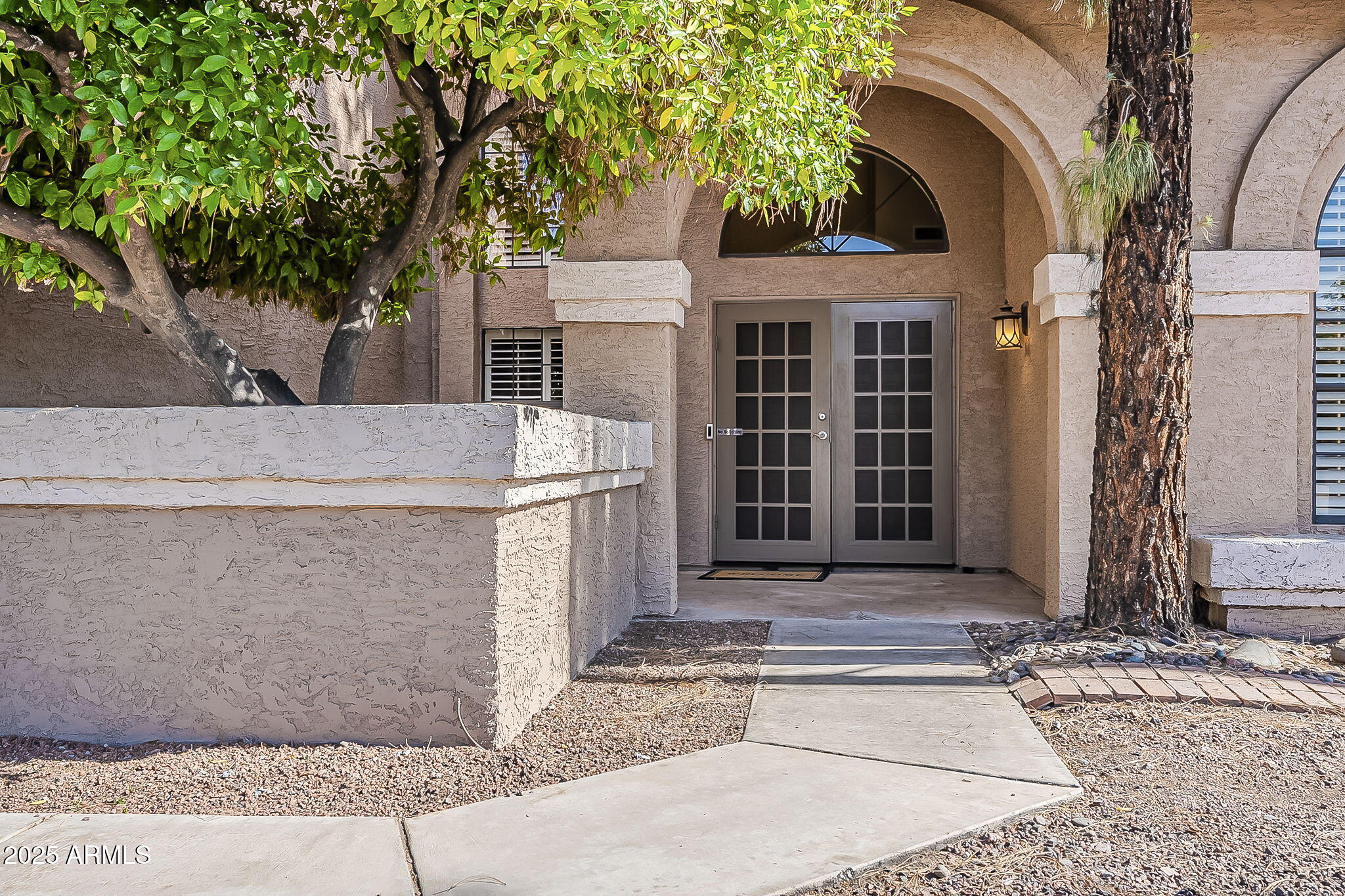 1927 East Ranch Road Tempe, AZ 85284 - Photo 3 of 64 a view of a house with a door and tree