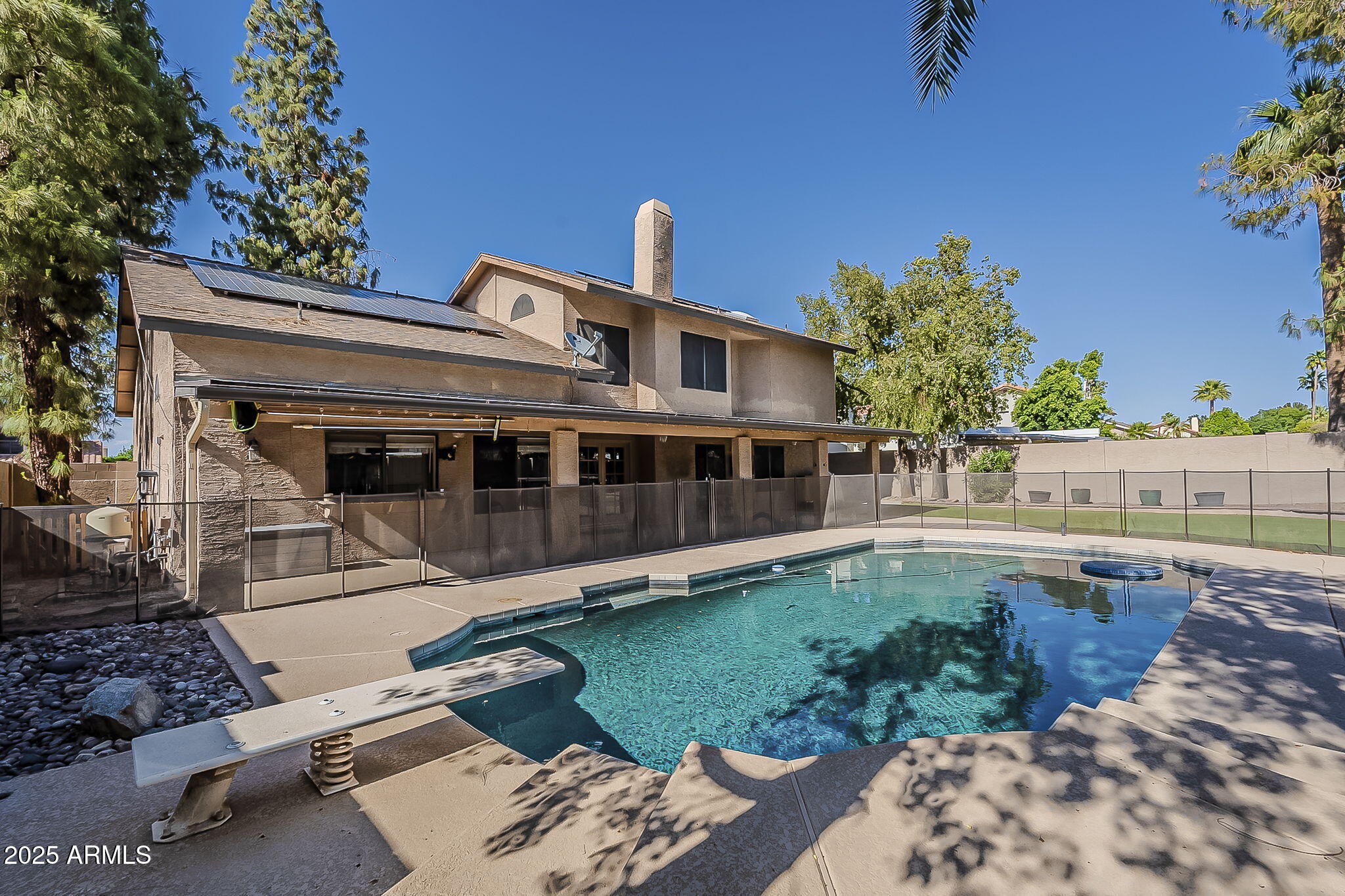 1927 East Ranch Road Tempe, AZ 85284 - Photo 55 of 64 a view of a house with a yard