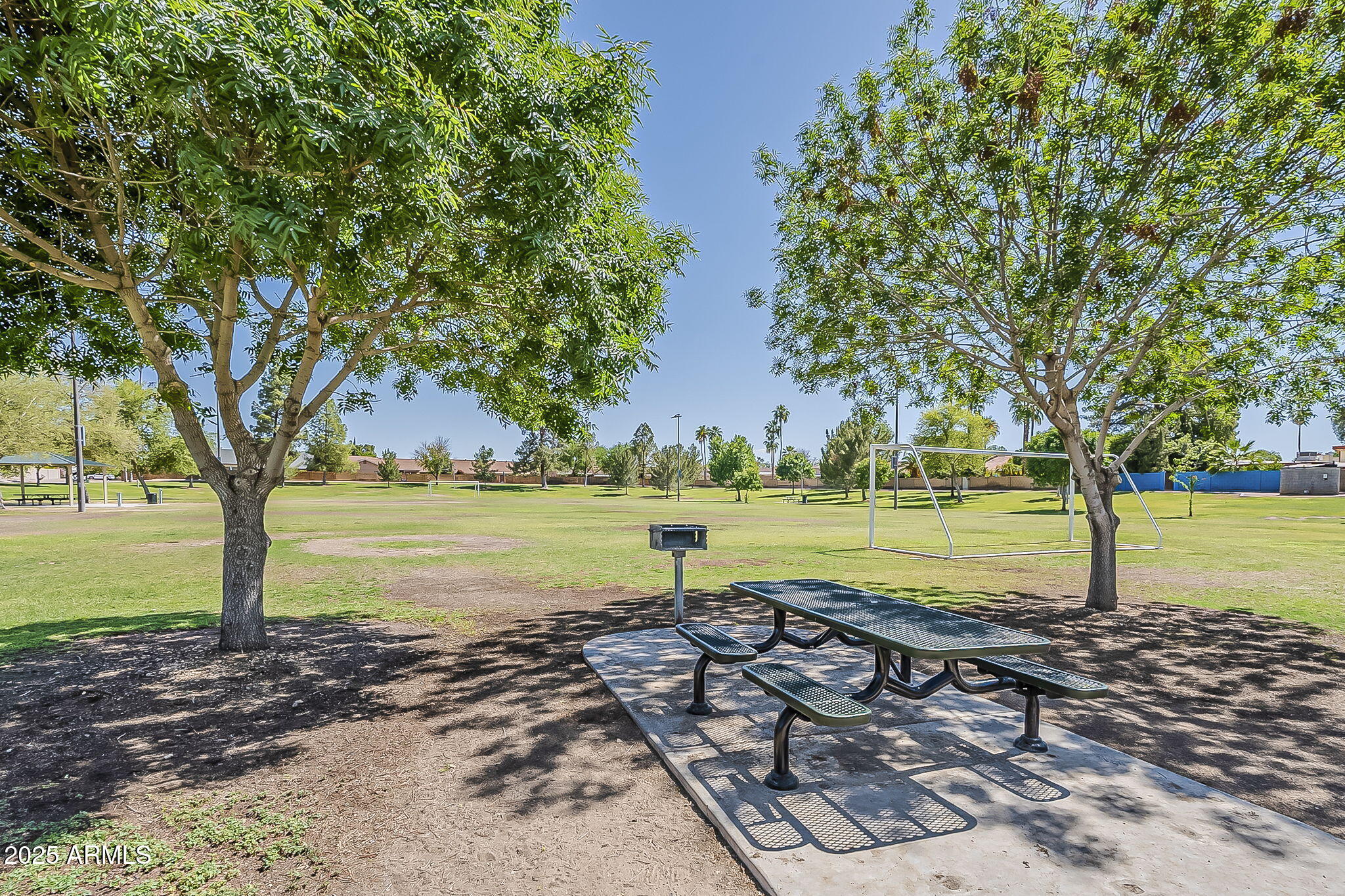 1927 East Ranch Road Tempe, AZ 85284 - Photo 56 of 64 a view of a lake with a large trees