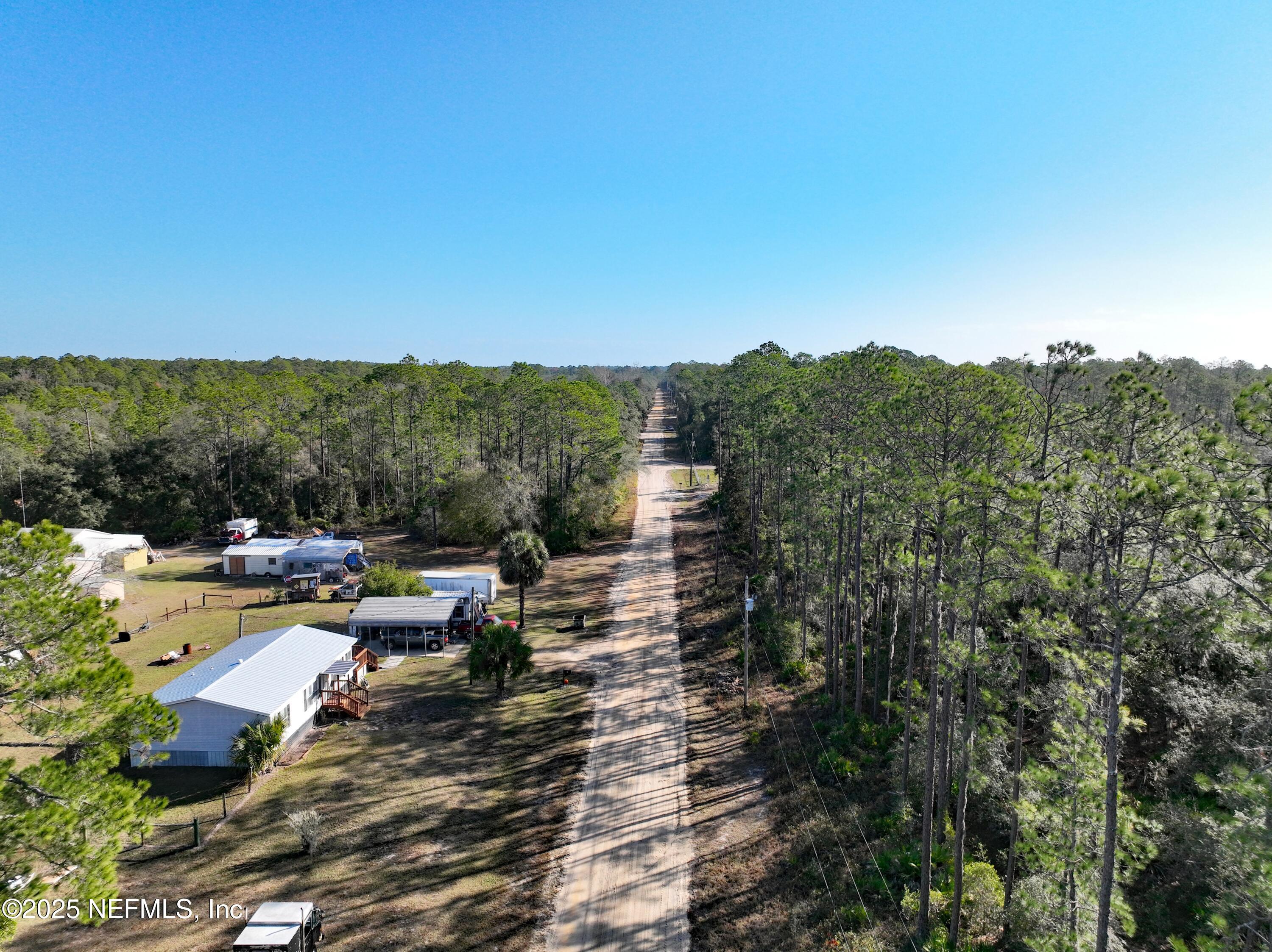 117 Glisson Street Interlachen, FL 32148 - Photo 20 of 20 a view of a terrace with sitting area