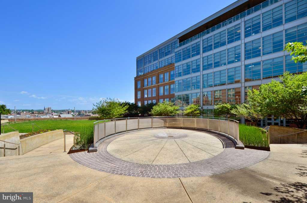 675 President Street, Unit 2607 Baltimore, MD 21202 - Photo 15 of 18 a view of a swimming pool with a patio