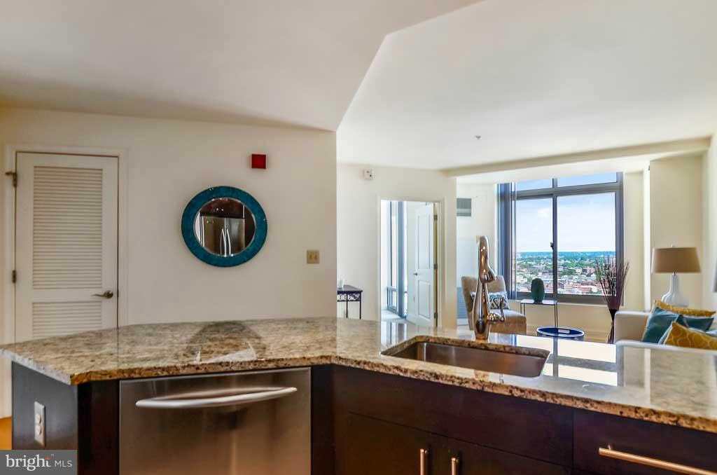 675 President Street, Unit 2607 Baltimore, MD 21202 - Photo 6 of 18 a kitchen with a stove and a sink